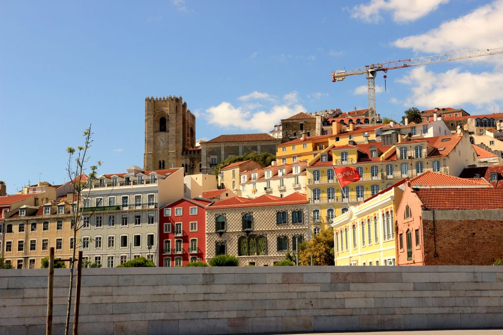 Alfama Lisbon colorful houses and church