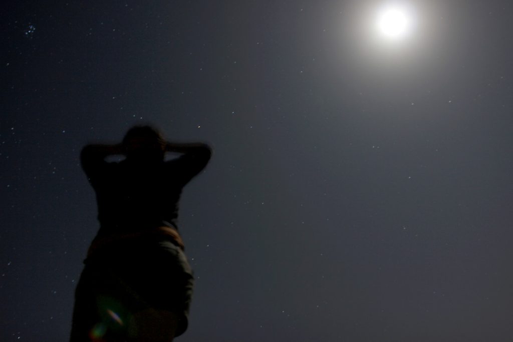 Night shoot with woman and full moon